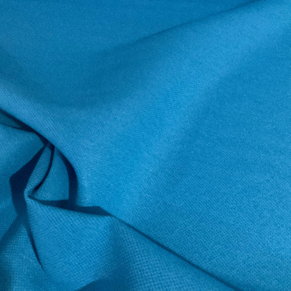 Momentum Marathon Cyan Solid Blue Upholstery Fabric