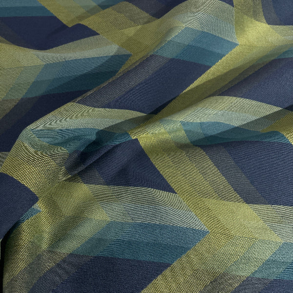 Fabric with blue and green geometric pattern