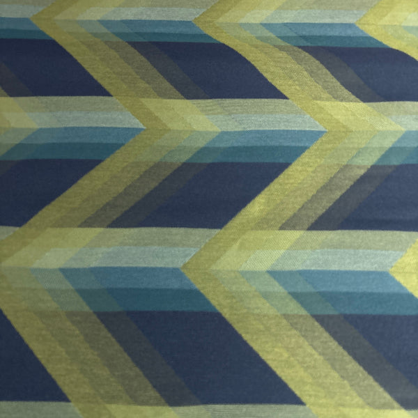 Patterned fabric with blue and green chevron design