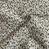 Remnant of Momentum Clip Ivory Black Upholstery Fabric
