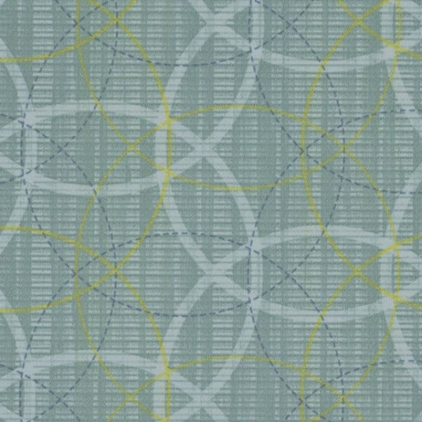 A woven designer upholstery weight fabric in blue and green tones. Suitable for sofas, chairs, pillows, headboards, designer bags and other upholstery craft projects. 