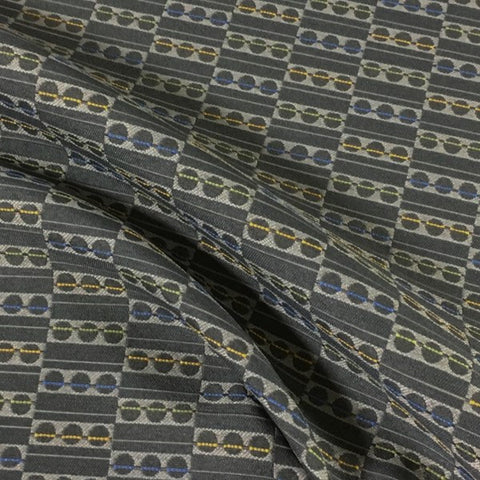Remnant of Momentum Focal Metro Upholstery Fabric