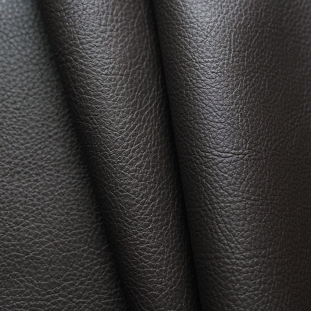 Remnant of Copy Cow Brown Swiss Brown Upholstery Vinyl