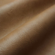 Richloom Fabrics Upholstery Fabric Solid Faux Leather Orissa Tobacco Toto Fabrics